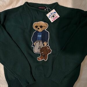Women bear sweater